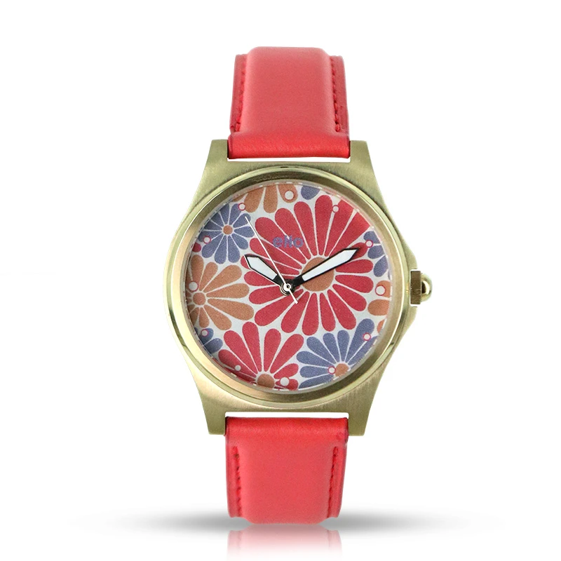 Cadran floral vibrant, cuir rouge, boîtier doré, upcyclée en France.